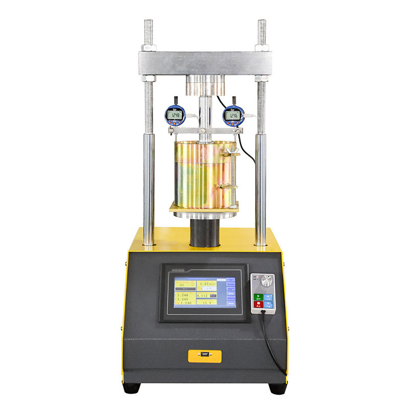 column structure with a yellow and gray base. It is equipped with a digital touch screen for operation and data display, and two digital gauges to measure deformation.