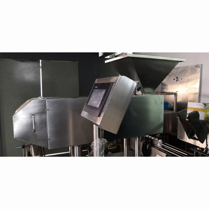 This figure focuses on the details of the equipment's touchscreen and counting module.