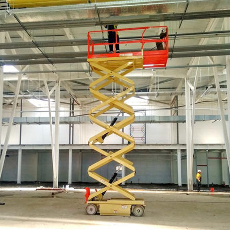 Electric used scissor lift, construction, clean and efficient for site work.