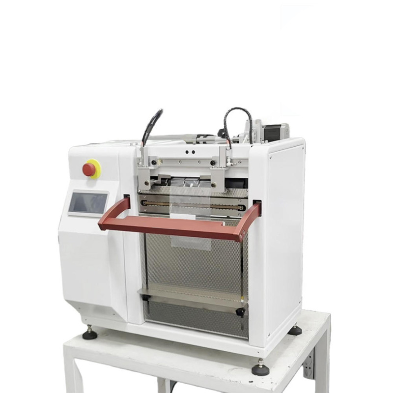 Fast packing auto roll-fed poly parts bag sealer view.