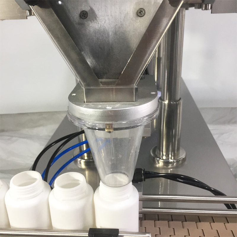 Details of the capsule counting and bottling machine outlet