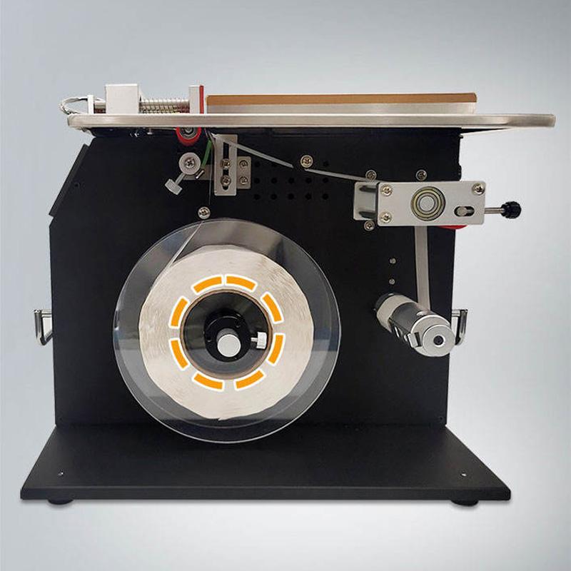 Tamper proof mask box corner labeler front view.