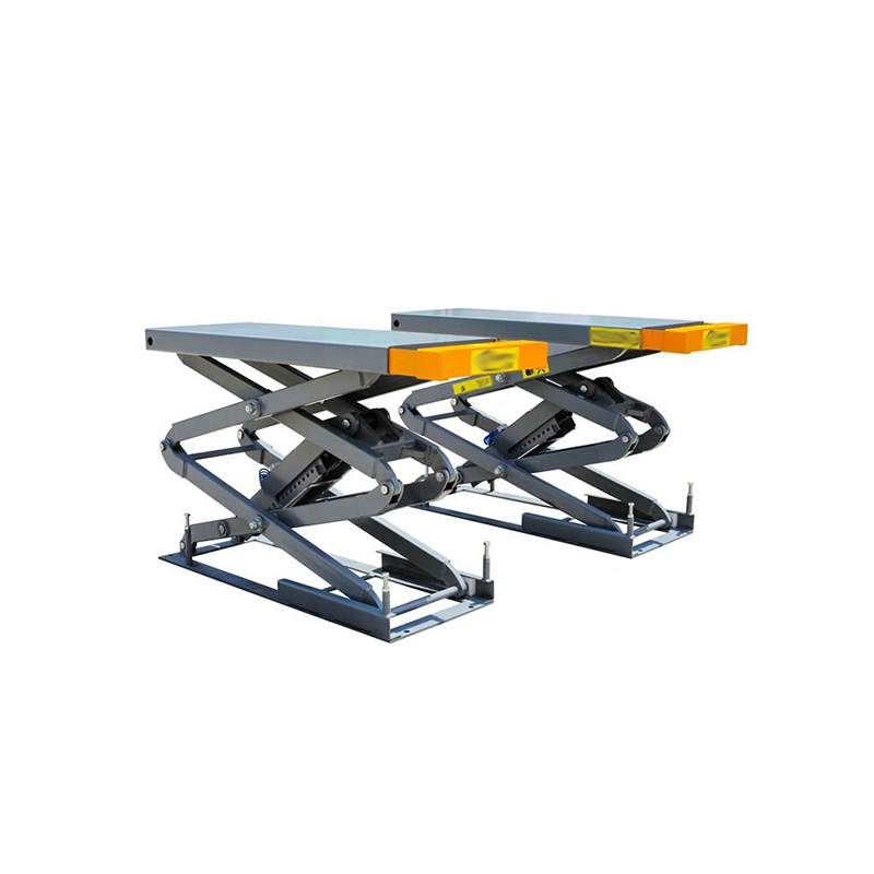The scissor car lift at the repair shop is made of high-strength steel.