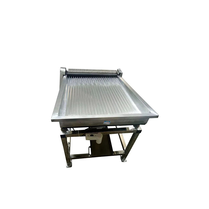 The commercial stainless steel pea sheller has a small footprint.