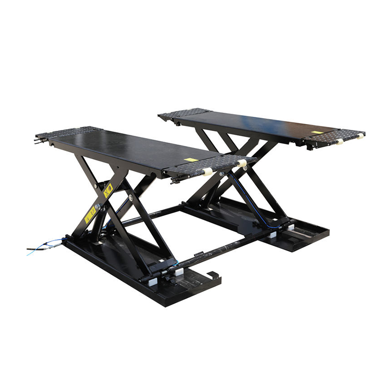 Portable and movable low-profile lift provides stability when lifting vehicles