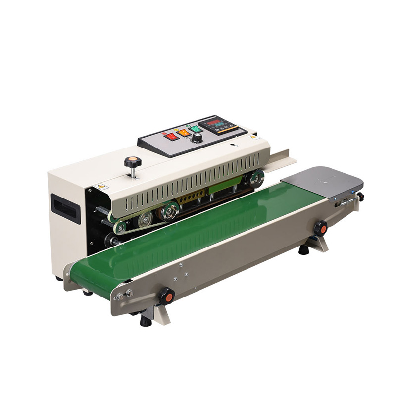 Food grade sealing machine for fresh food packs.