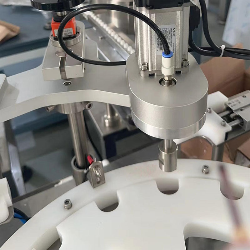 Small bottle filling and capping machine for vial packaging