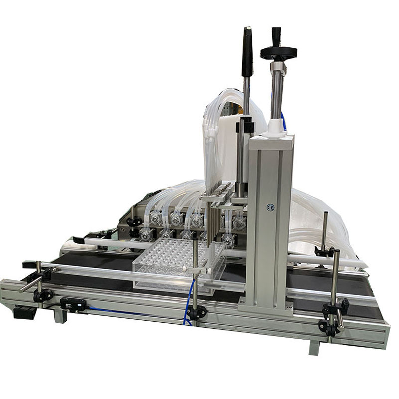 Liquid filling system for small vials and tubes